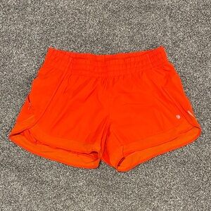 Athleta | Mesh Racer Run Mid Rise 4" Orange Short Size: M